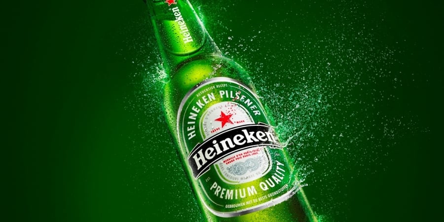 Heineken sold more beer than expected in the first quarter, reporting its first quarterly year-on-year growth in volumes in a year as it