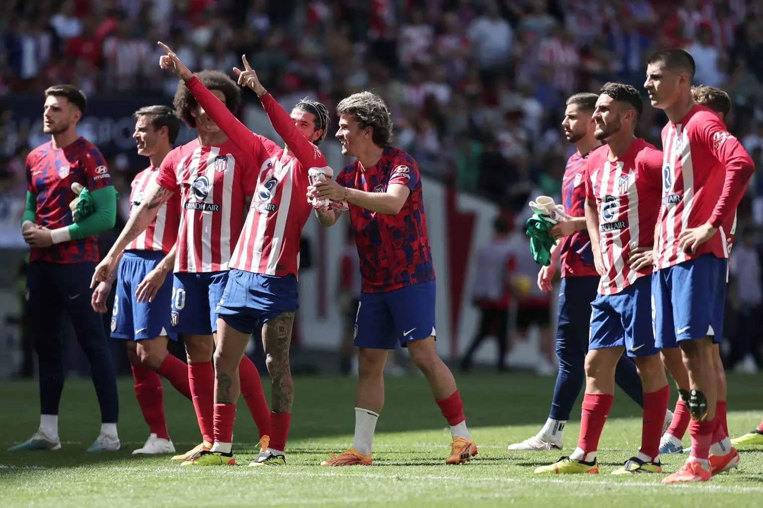Griezmann strikes twice as Atletico sink Girona