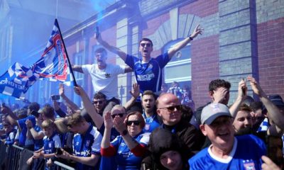 Goals from Wes Burns and Omari Hutchinson fired Ipswich back into the Premier League for the first time in 22 years with the 2-0 win