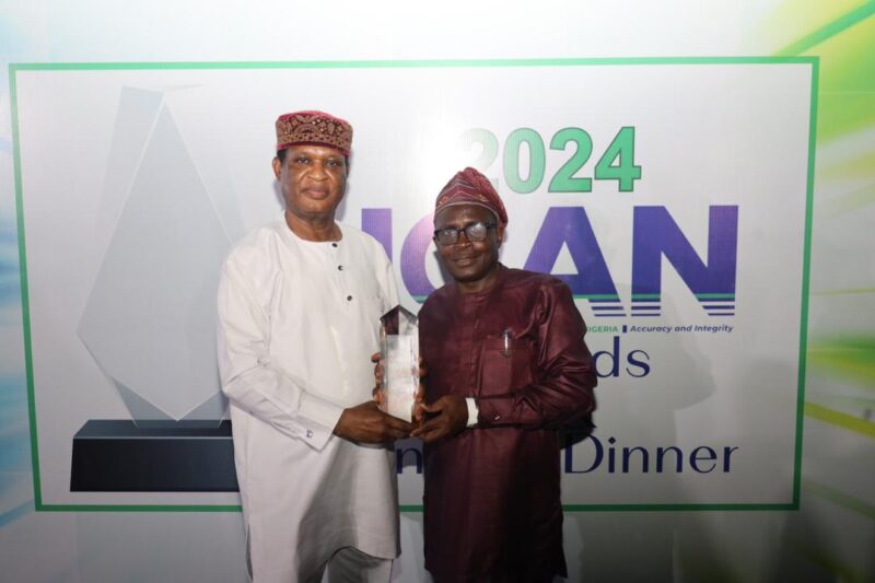 From Left: Captain Godfrey Ogbogu, Safety Manager and Mr Joshua Okon, Head of Internal Control and Audit, both of Air Peace, at the ICAN Awards and Dinner where the airline won an Achievement Award recently.