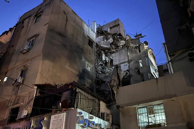 Explosions rock Beirut as Israel carries out airstrike targeting Hezbollah commander