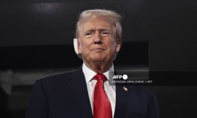 Trump attends Republican convention with bandaged ear after assassination attempt