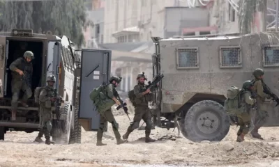 The Israeli military - pictured here on Wednesday - has conducted raids in a number of West Bank cities over the past two days