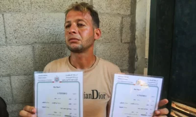 Father says baby twins killed by Israeli strike in Gaza as he registered births
