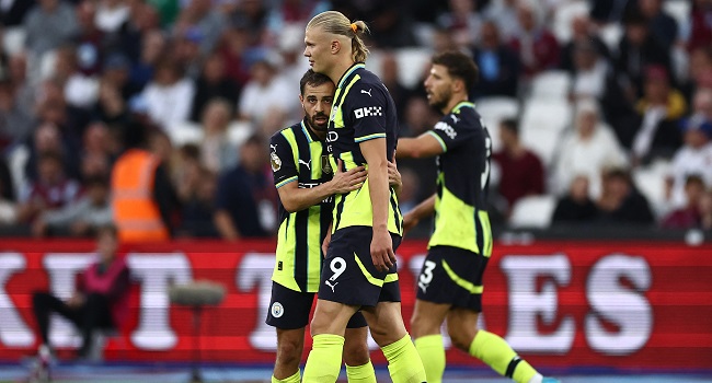 Erling Haaland fired Manchester City to the top of the Premier League with a second consecutive hat-trick in a 3-1 win at West Ham
