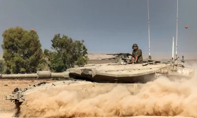 UK suspends some arms exports to Israel, foreign secretary says