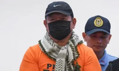 Mr Quiboloy pictured in an orange prison shirt in the capital Manila, where he is currently detained