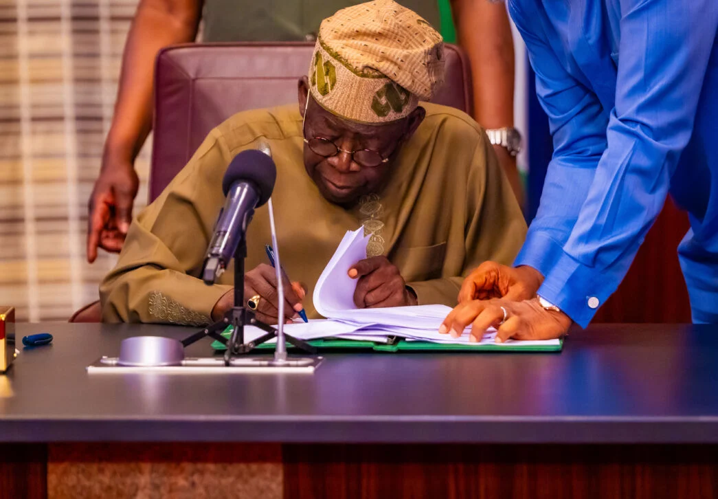 Fresh details as Tinubu signs tax reform bills into law