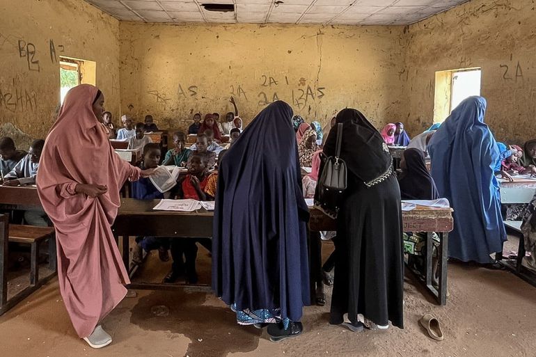One of the 25 schoolgirls abducted from a school in northwestern Nigeria has escaped and is safe, authorities confirmed on Tuesday, as hunters and security forces intensify their search for the remaining missing students, AP News reports.
