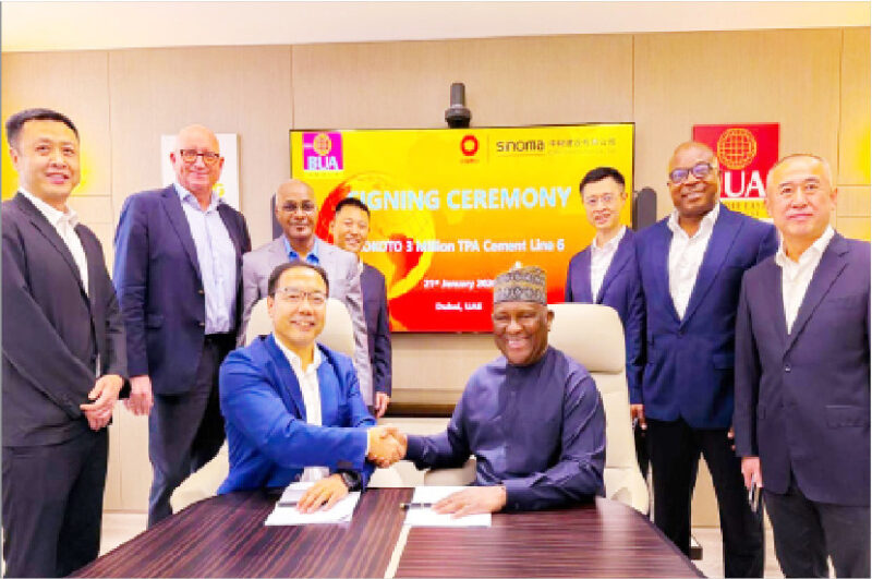 Chairman CBMI Construction Ltd., Zhang Sicai, in a handshake with the chairman, BUA Cement Plc, Abdul Samad Rabiu (sitting), flanked from left to right by: CBMI deputy director of Marketing, Zhang Wanjun; chief operations officer, BUA Cement Plc, Finn Arnoldsen; managing director, BUA Cement Plc. Yusuf Binji; assistant general manager, CBMI, Fengtao Geng; Nigeria regional manager CBMI, Tian Bao; chief financial officer, BUA Cement Plc, Chikezie Ajaero, and CBMI vice general manager, Yang Zhi,during the signing of an agreement with CBMI to build a new ultra-modern 3-million-ton-per-annum cement line in Sokoto, yesterday. PHOTO BUA Cement