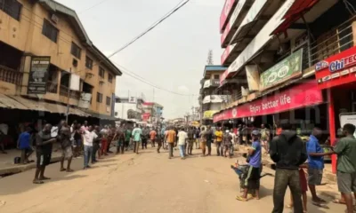 Fear Grips Onitsha as Coffin Blocks Market Gate in Defiance of Reopening Order